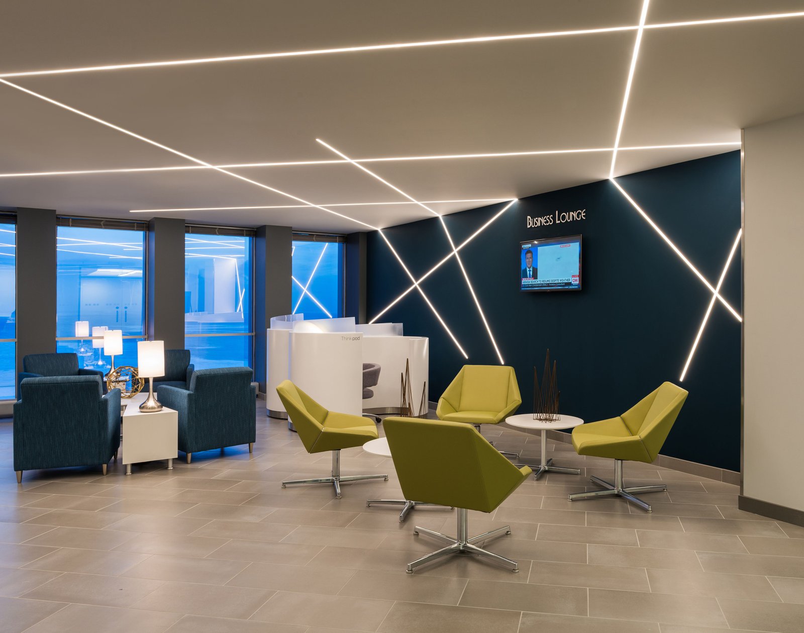 Bright lighting in office lobby space with a futuristic design
